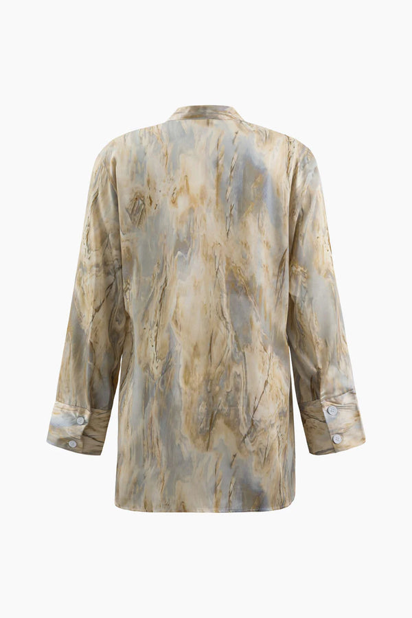 Amaya™️ | Asymmetrische blouse met marmerprint en lange mouwen